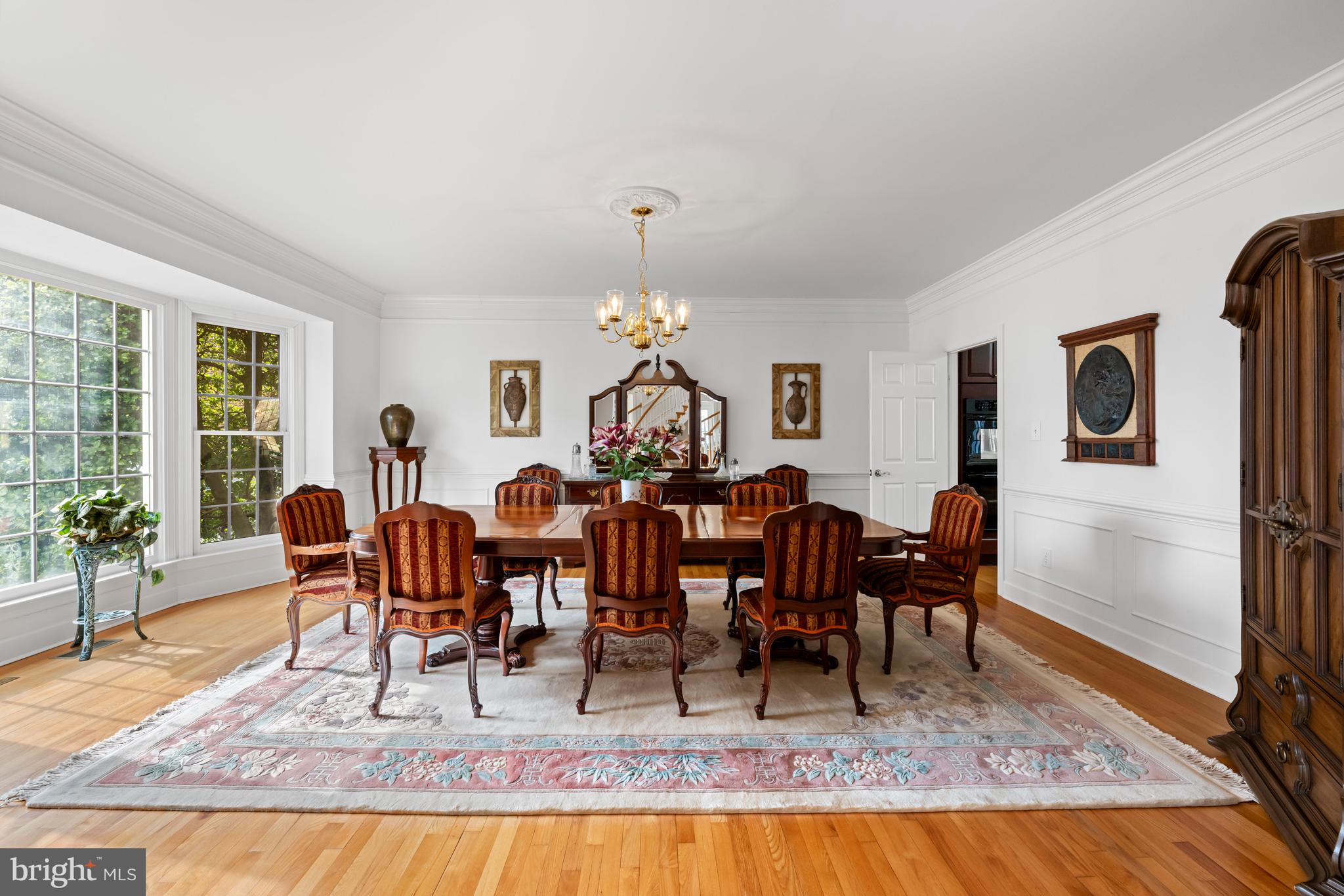9420 Crimson Leaf Terrace Potomac, MD 20854 - Photo 11 of 33 a view of a dining room with furniture