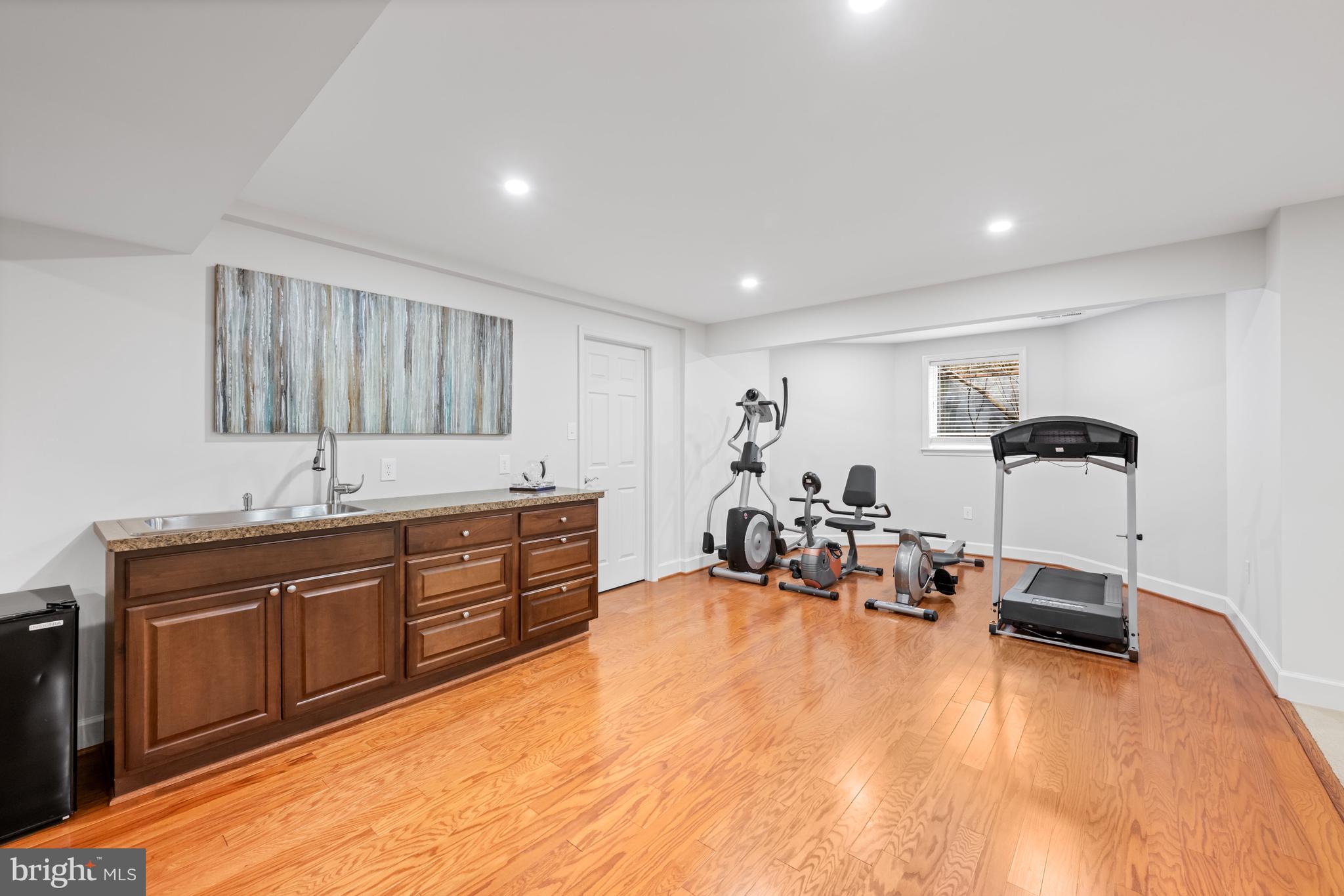 9420 Crimson Leaf Terrace Potomac, MD 20854 - Photo 23 of 33 a large bedroom with a bed and furniture