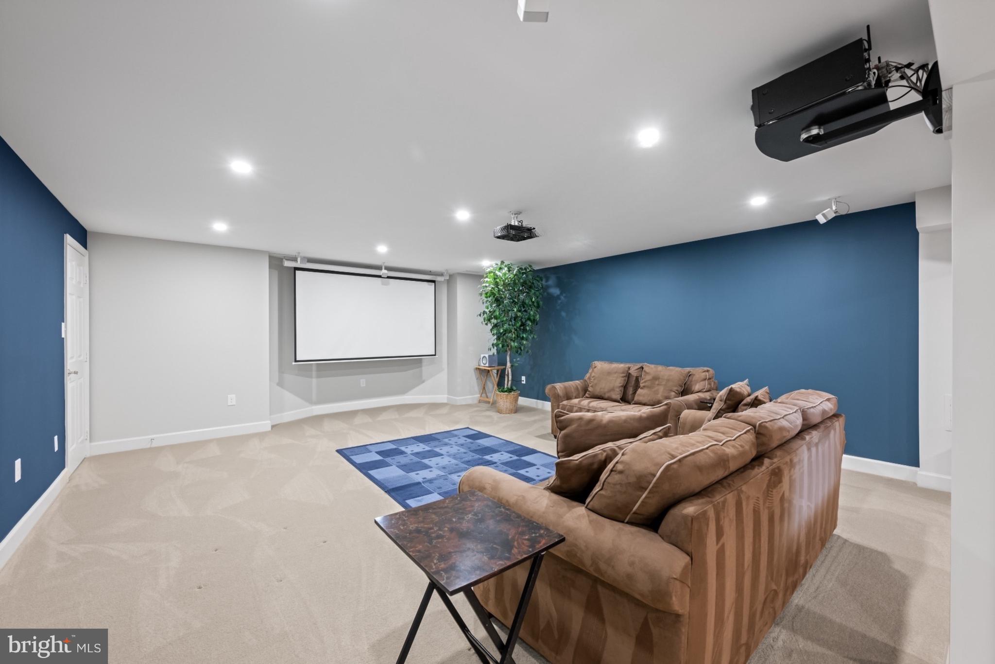 9420 Crimson Leaf Terrace Potomac, MD 20854 - Photo 24 of 33 a living room with furniture and a rug