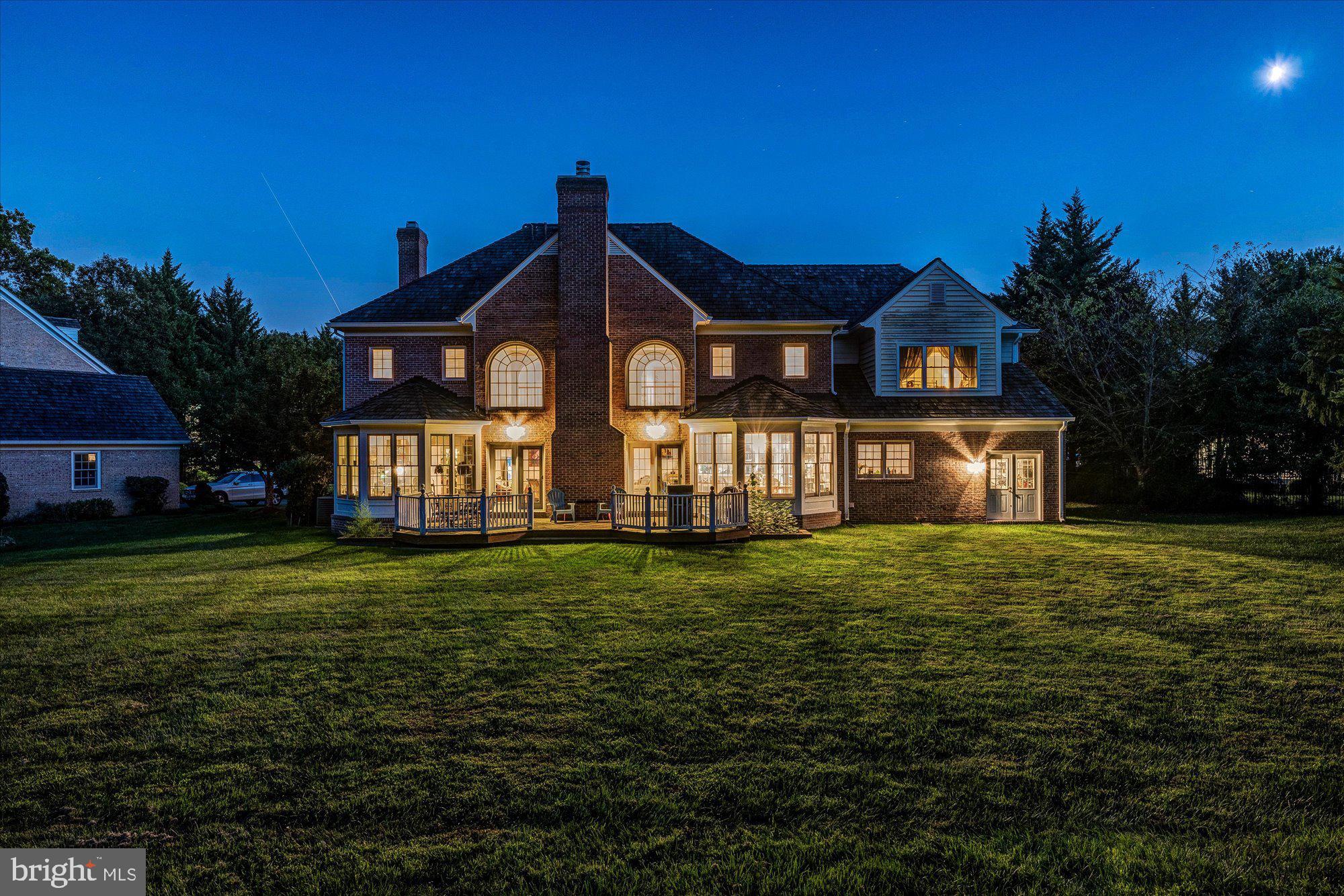 9420 Crimson Leaf Terrace Potomac, MD 20854 - Photo 27 of 33 a front view of a house with a yard