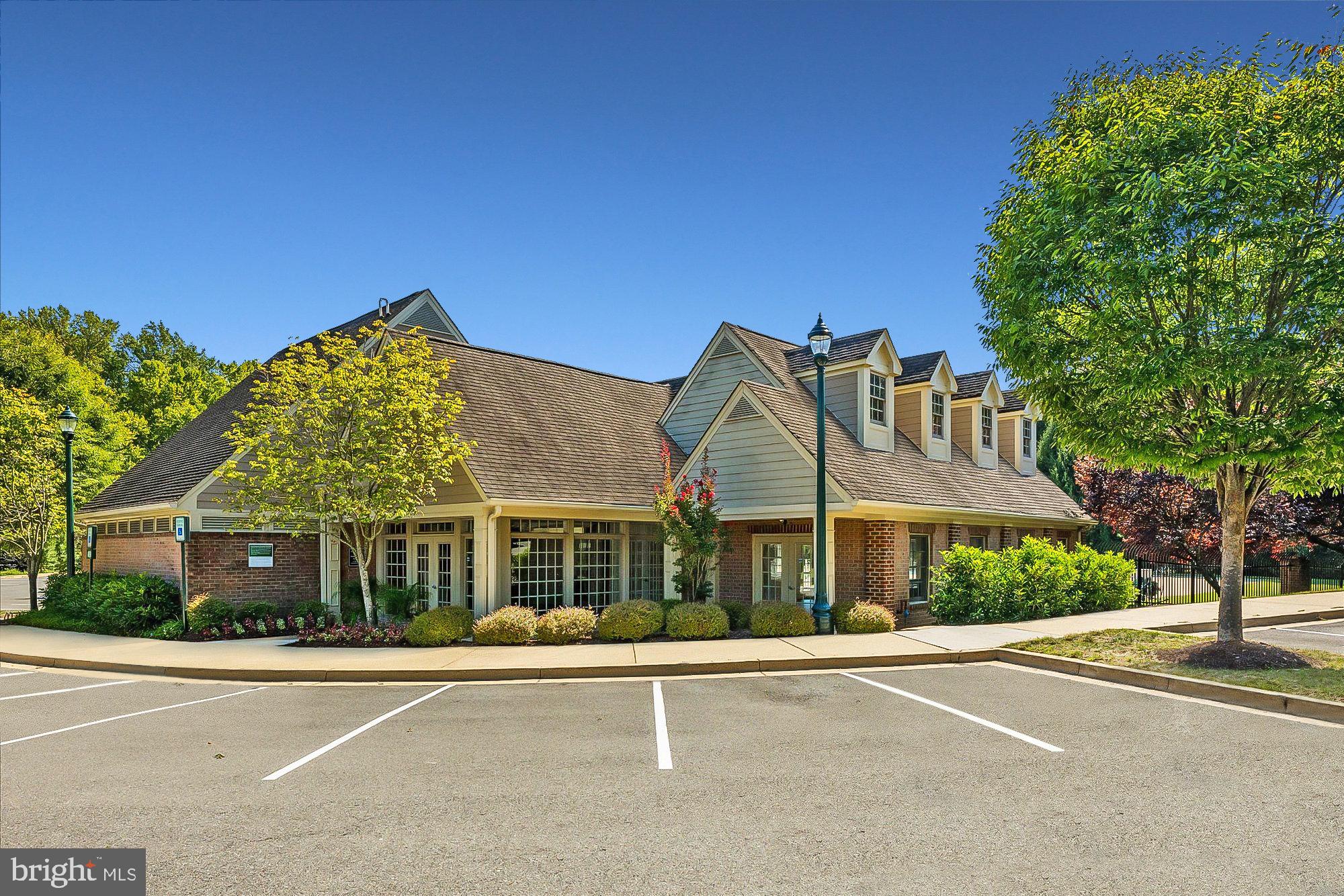 9420 Crimson Leaf Terrace Potomac, MD 20854 - Photo 29 of 33 front view of a house with a yard