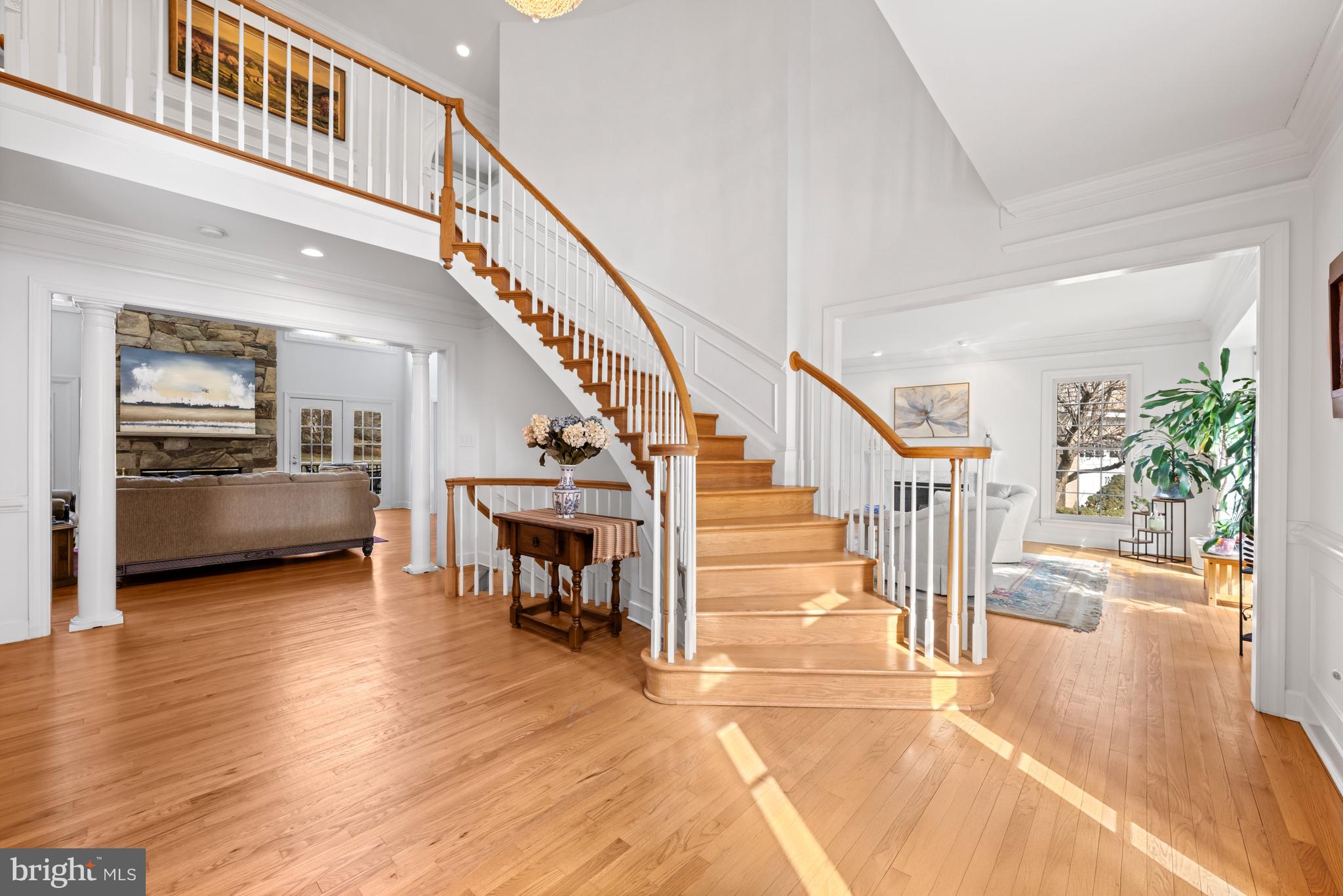 9420 Crimson Leaf Terrace Potomac, MD 20854 - Photo 3 of 33 a view of entryway and hall with wooden floor