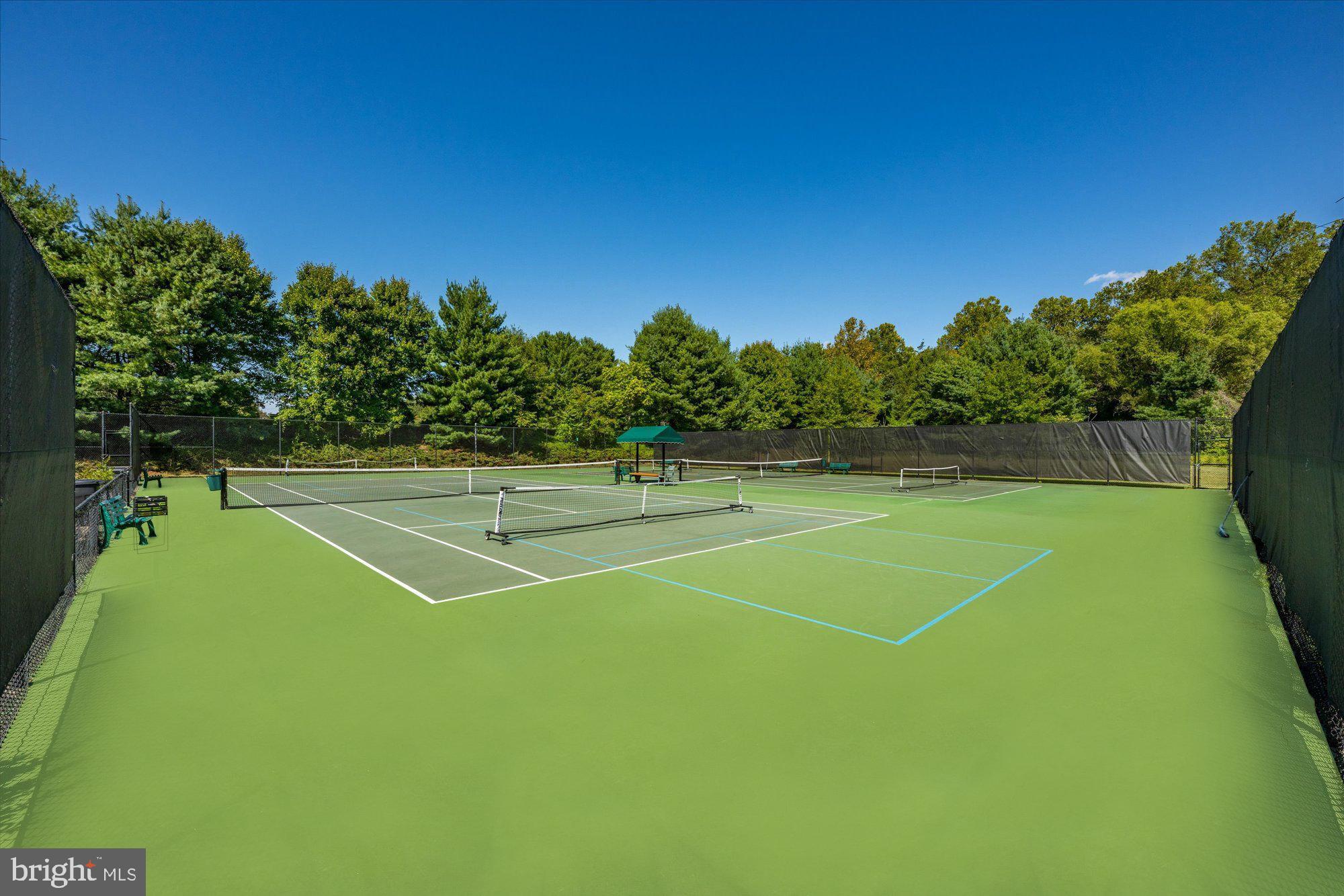 9420 Crimson Leaf Terrace Potomac, MD 20854 - Photo 32 of 33 a view of a tennis court