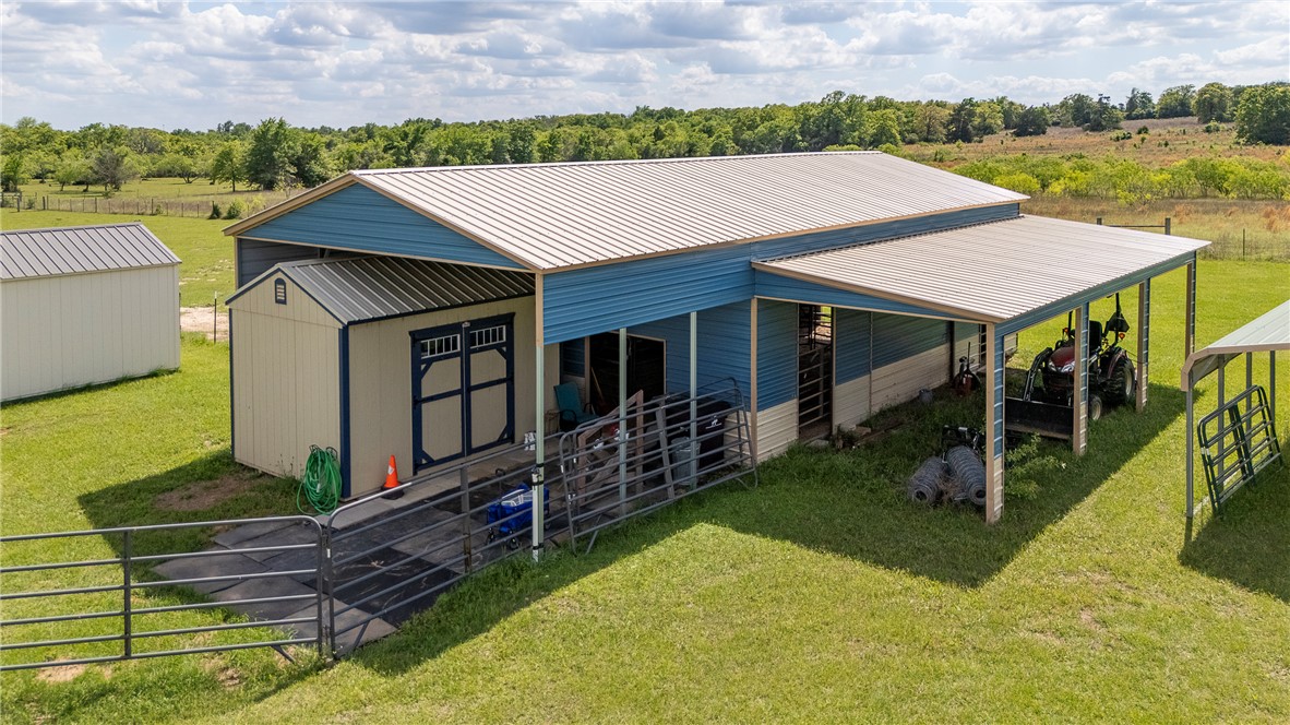 10976 Whiterock Road Bremond, TX 76629 - Photo 4 of 42 an aerial view of a house with porch
