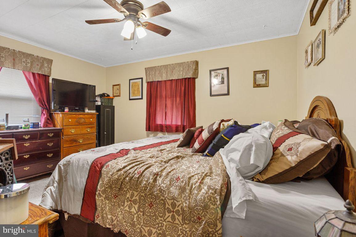 150 Sherman Street Hanover, PA 17331 - Photo 11 of 24 a bedroom with bed and a flat screen tv