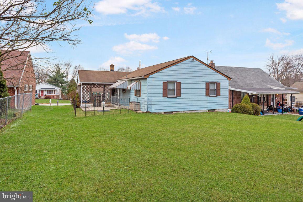150 Sherman Street Hanover, PA 17331 - Photo 21 of 24 a front view of a house with a garden and patio