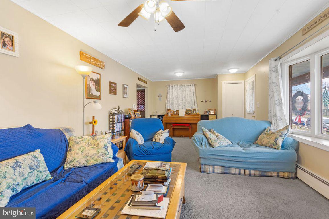 150 Sherman Street Hanover, PA 17331 - Photo 5 of 24 a living room with furniture and wooden floor