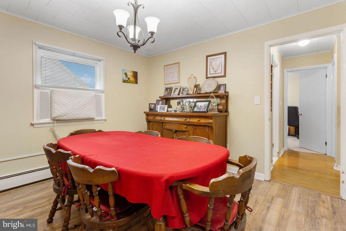 150 Sherman Street Hanover, PA 17331 - Photo 9 of 24 a view of a dining room with furniture and chandelier