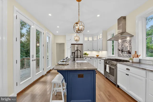 a bedroom with a bed and a table in it