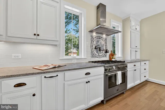 a bathroom with a sink toilet tub and shower