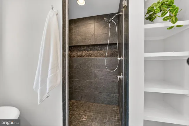 a view of a house with a yard porch and sitting area