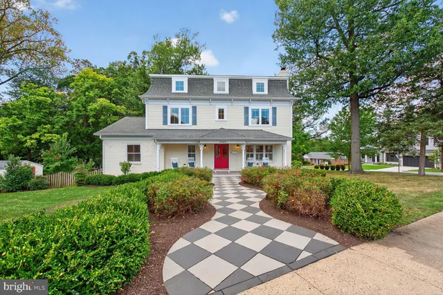 a living room with couches and a fireplace