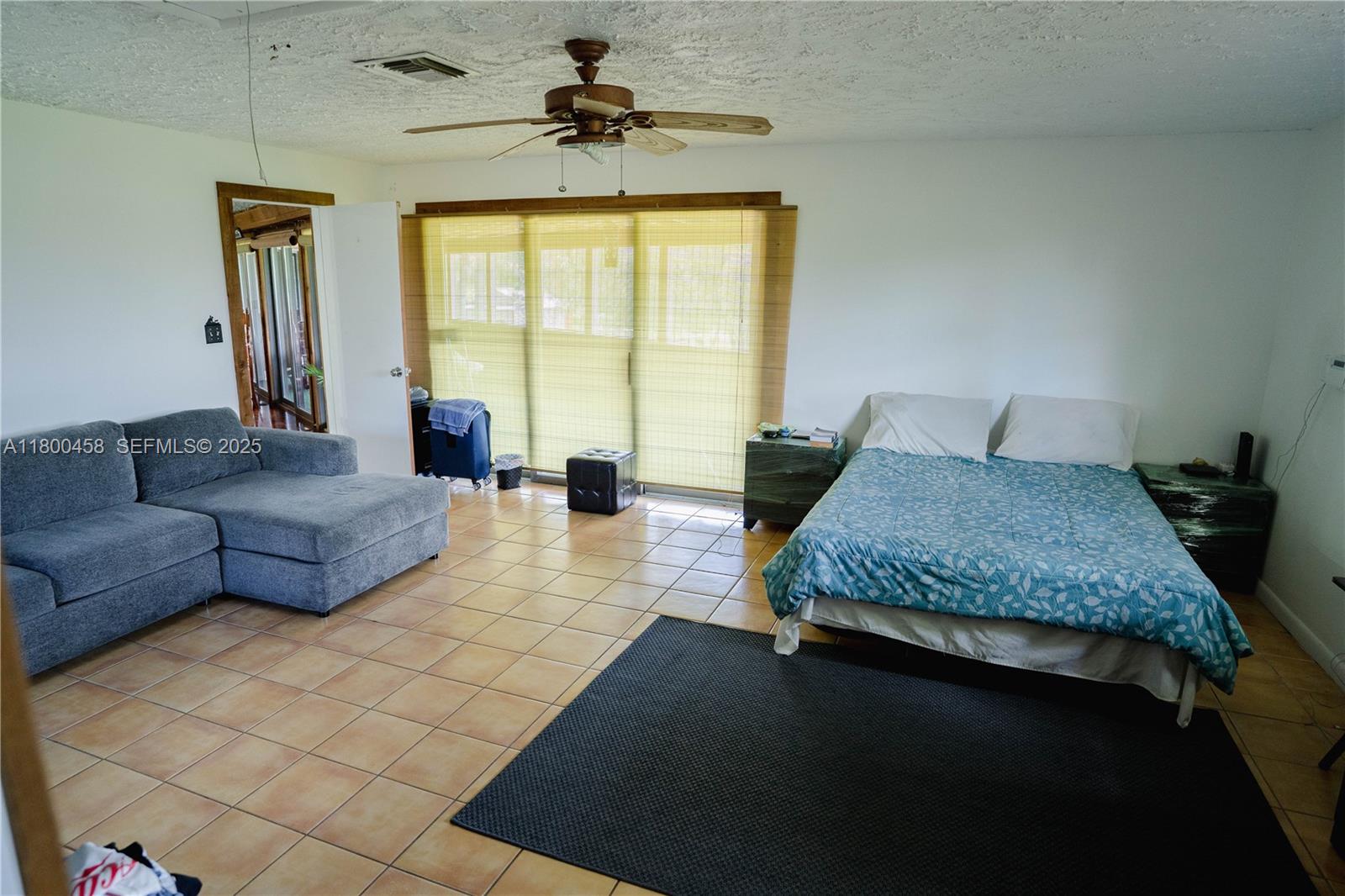 North Okeechobee Okeechobee, FL 34972 - Photo 13 of 23 a living room with furniture and a large window