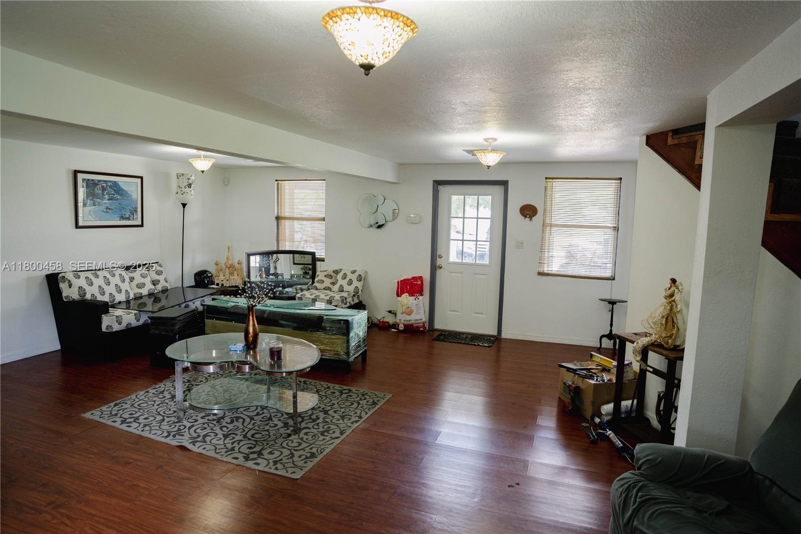 North Okeechobee Okeechobee, FL 34972 - Photo 5 of 23 a living room with furniture and wooden floor