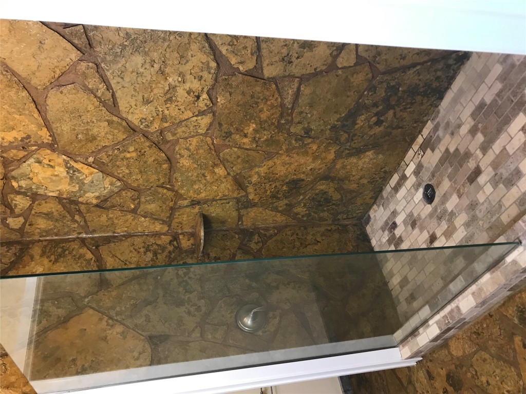 19600 Bee Creek Tavern Road, Unit B Spicewood, TX 78669 - Photo 13 of 13 a bathroom with a shower