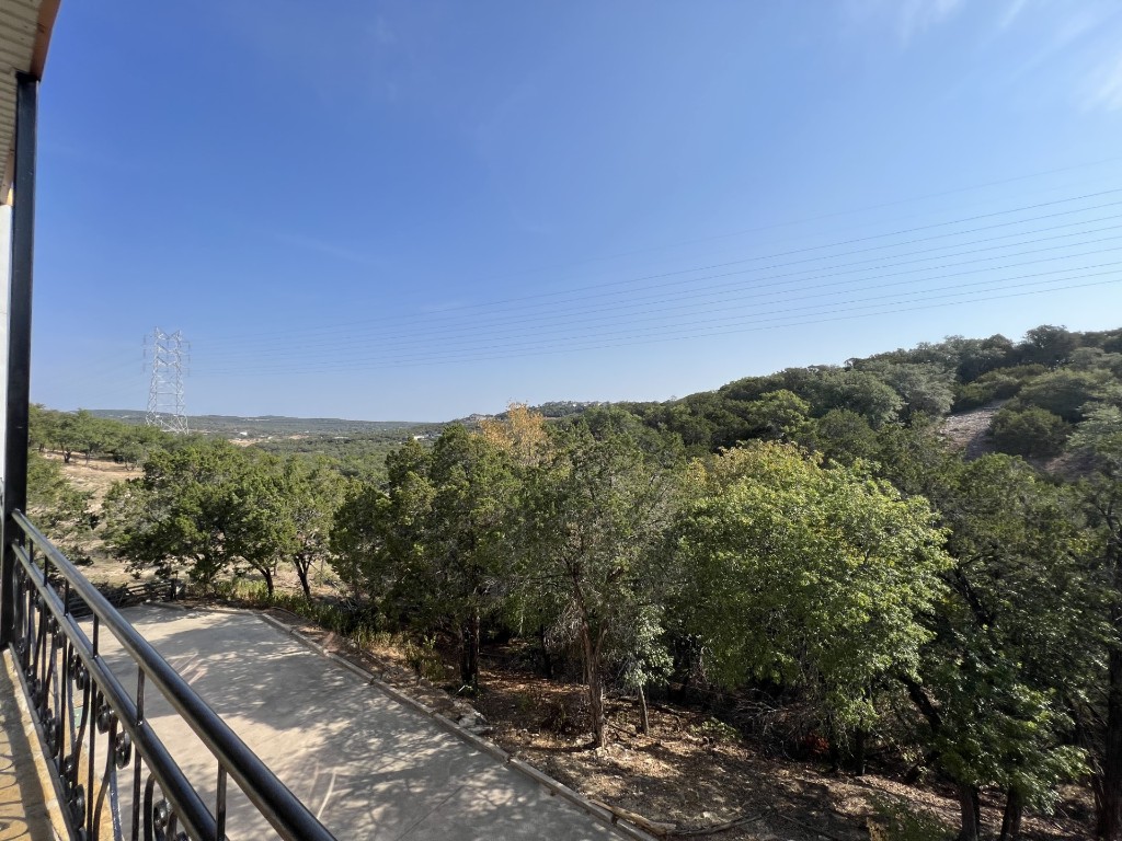 19600 Bee Creek Tavern Road, Unit B Spicewood, TX 78669 - Photo 3 of 13 a view of a city from a balcony