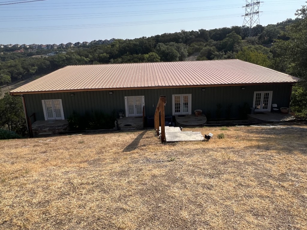 19600 Bee Creek Tavern Road, Unit B Spicewood, TX 78669 - Photo 4 of 13 a backyard of a house