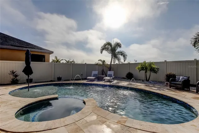 an aerial view of a house with a garden