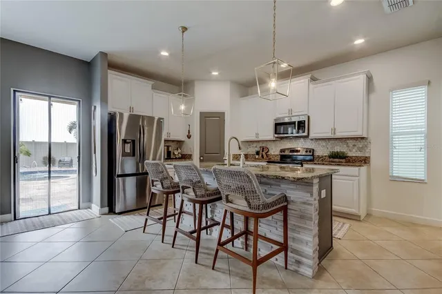 a bedroom with bed and window