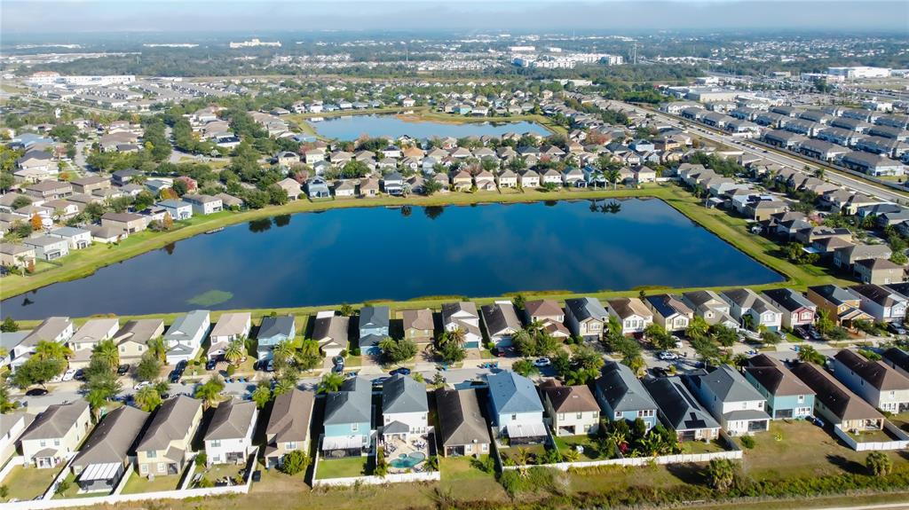 10141 Newminster Loop Ruskin, FL 33573 - Photo 8 of 77 an aerial view of residential houses with outdoor space