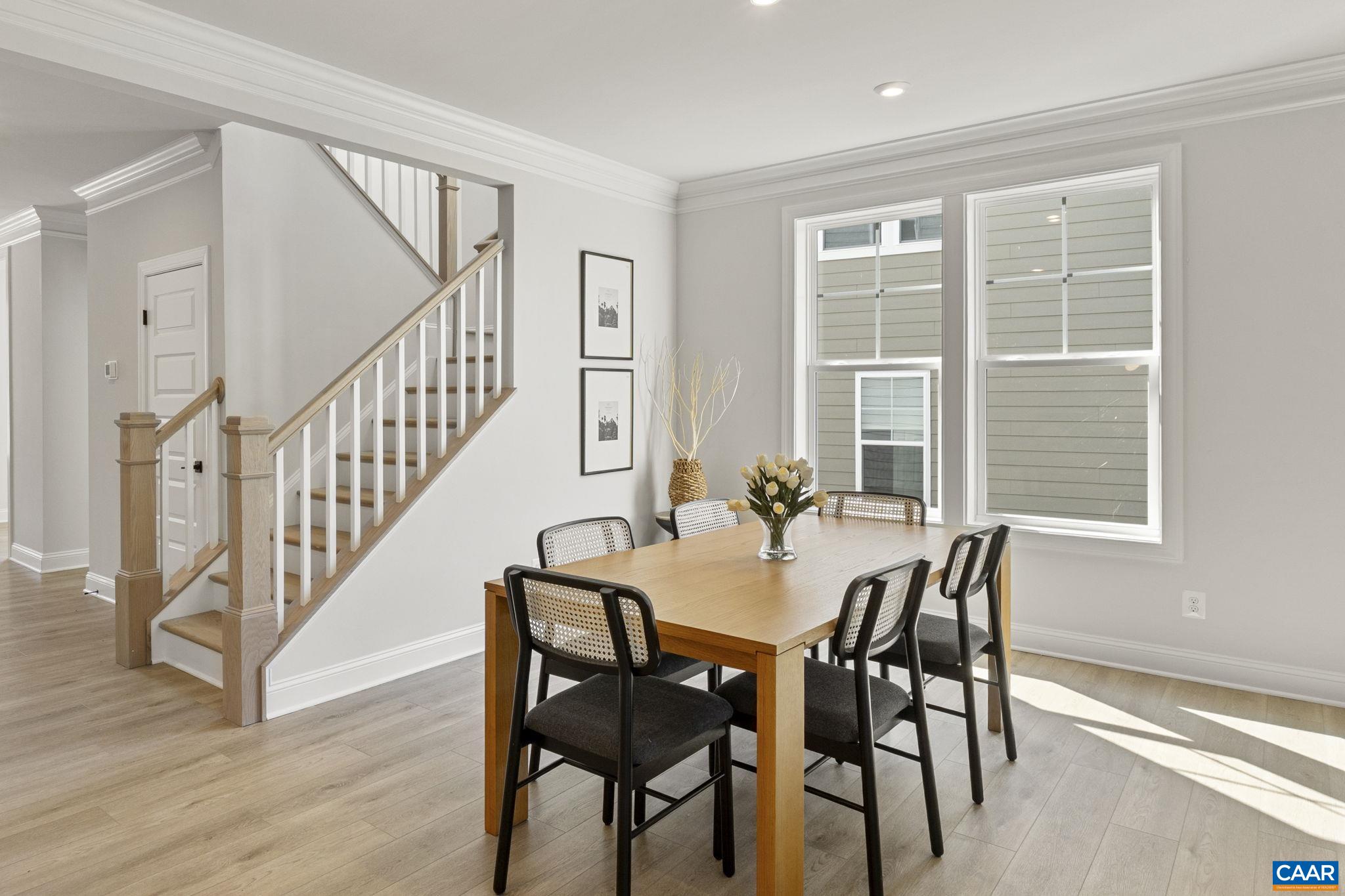 114 D Marcella Street Charlottesville, VA 22911 - Photo 12 of 58 a view of a dining room with furniture and a window