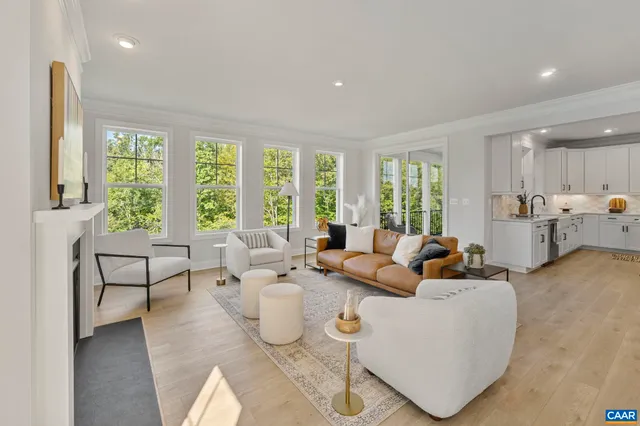 a balcony with furniture and a potted plant