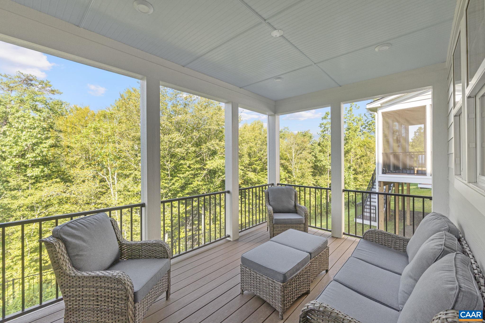 114 D Marcella Street Charlottesville, VA 22911 - Photo 16 of 58 a balcony with furniture and a potted plant
