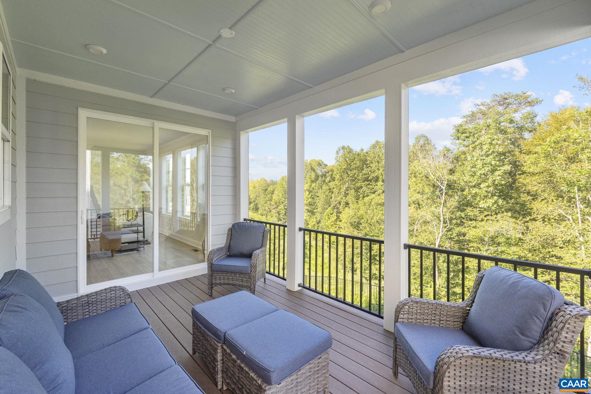 114 D Marcella Street Charlottesville, VA 22911 - Photo 17 of 58 a living room with furniture and a window