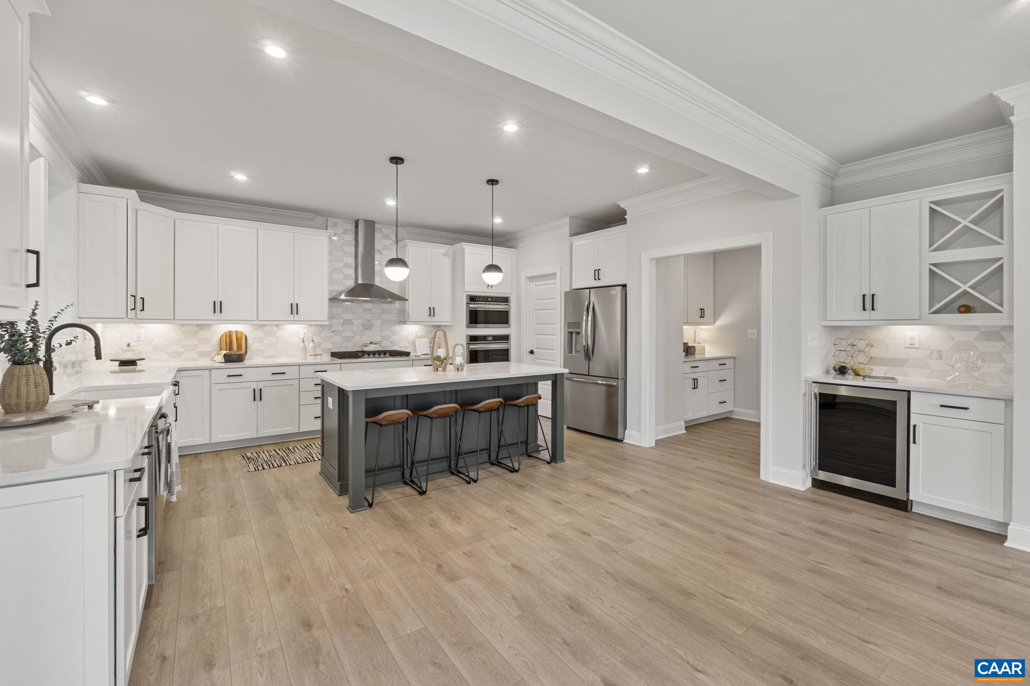 114 D Marcella Street Charlottesville, VA 22911 - Photo 18 of 58 a kitchen with stainless steel appliances granite countertop a refrigerator sink and stove
