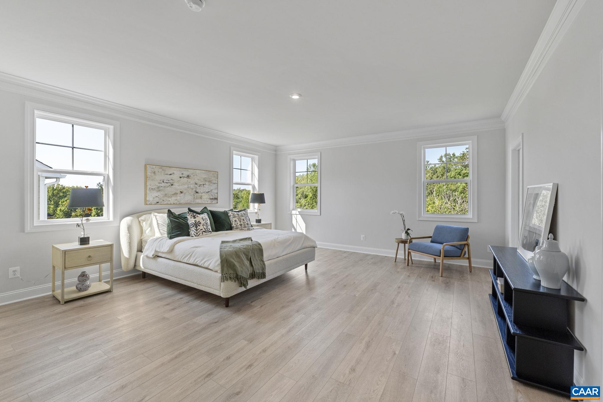 114 D Marcella Street Charlottesville, VA 22911 - Photo 29 of 58 a living room with furniture and a wooden floor