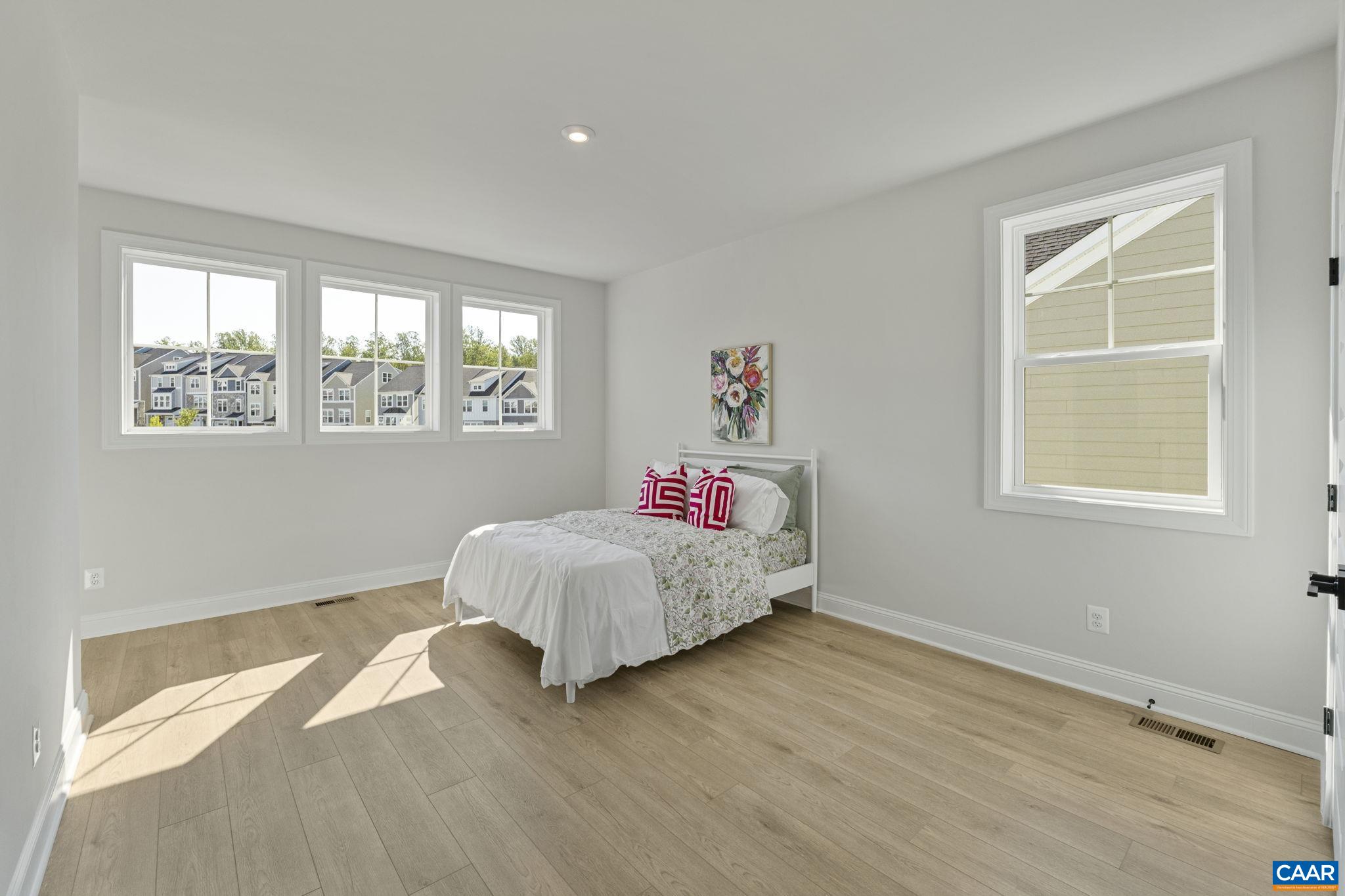 114 D Marcella Street Charlottesville, VA 22911 - Photo 38 of 58 a bedroom with a bed and a window