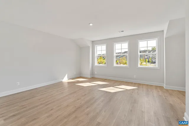 a bathroom with a bathtub and a toilet