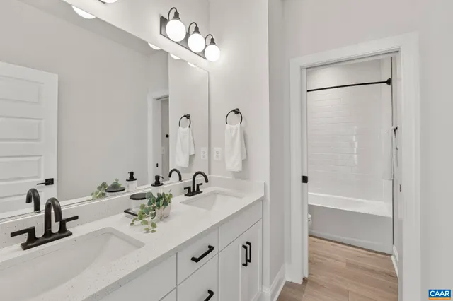 a bed room with a bed and a window