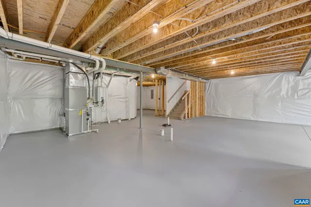 a picture of a book and a white bed