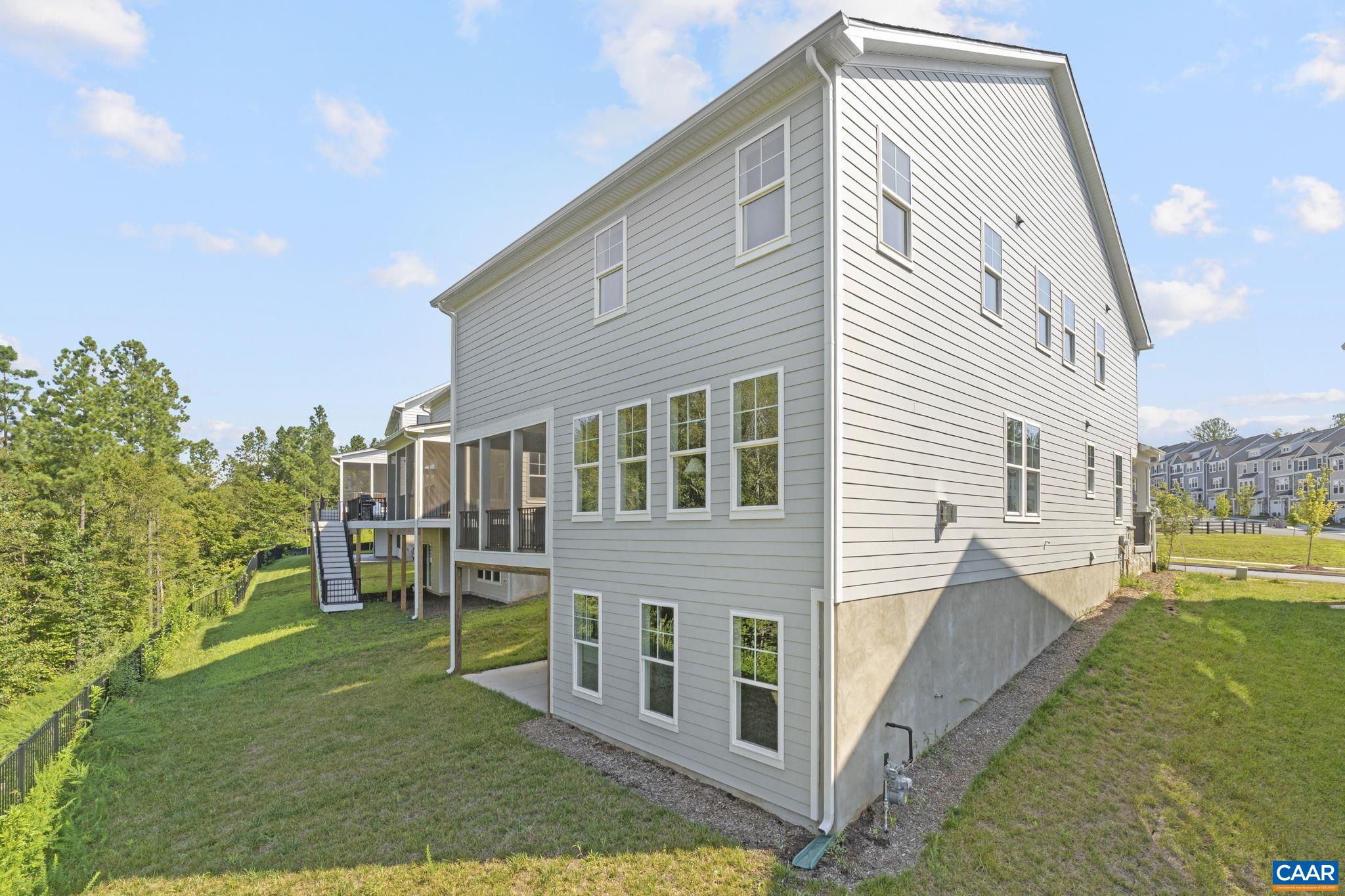 114 D Marcella Street Charlottesville, VA 22911 - Photo 51 of 58 a view of a house with a yard