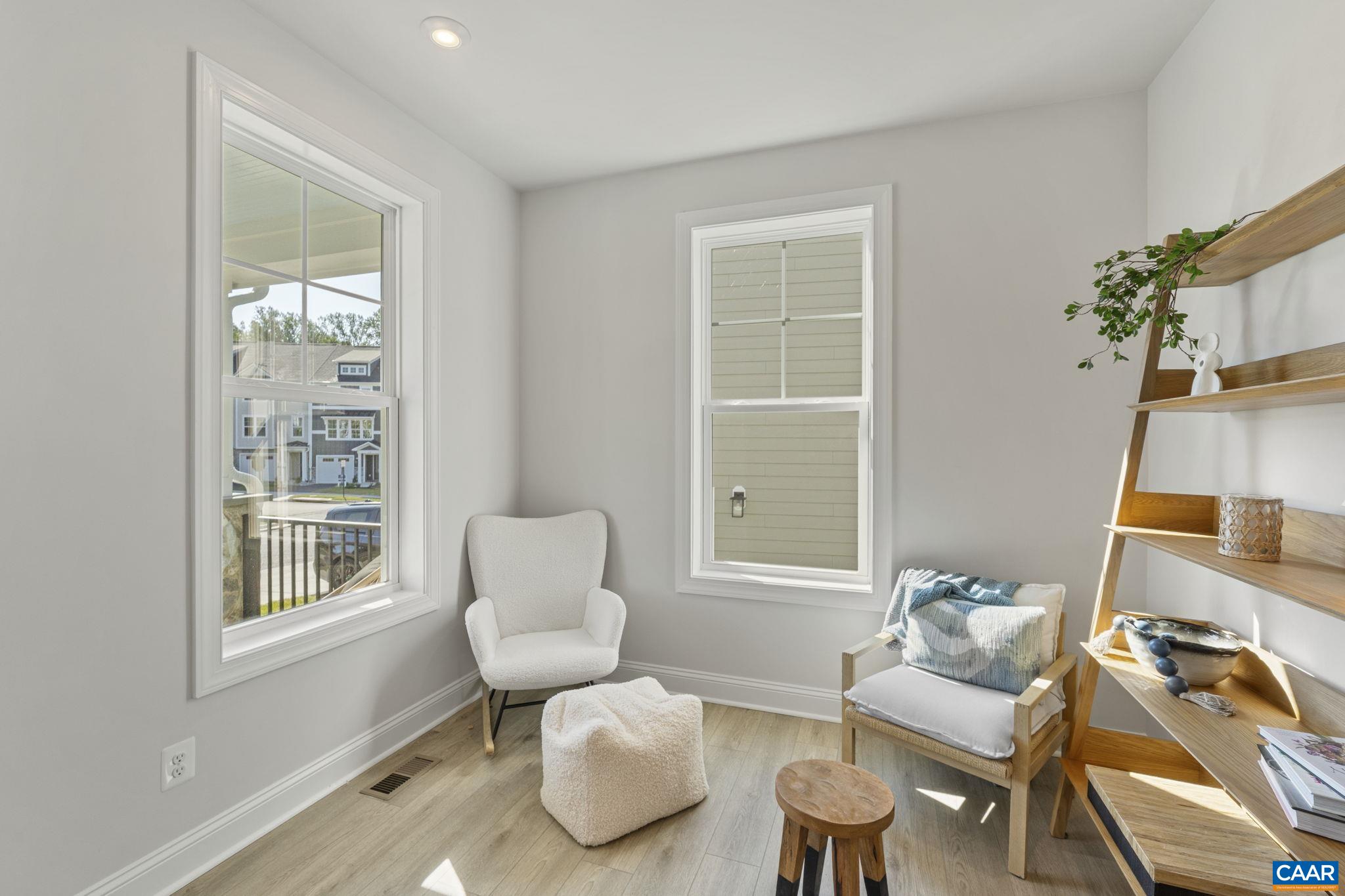 114 D Marcella Street Charlottesville, VA 22911 - Photo 7 of 58 a living room with furniture and a window