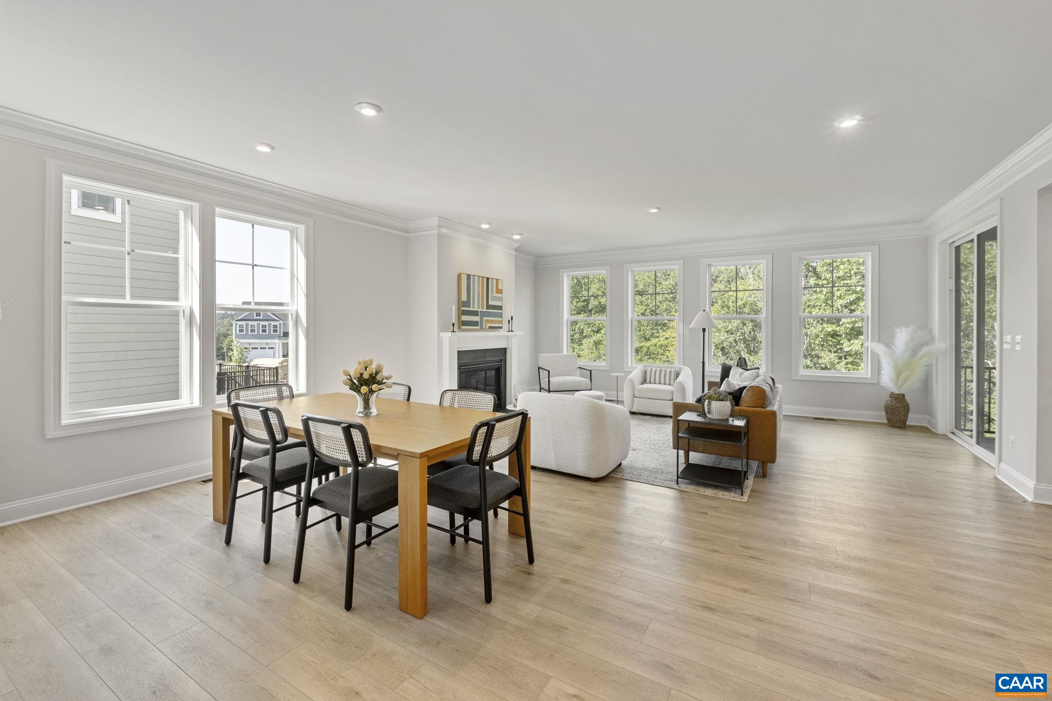 114 D Marcella Street Charlottesville, VA 22911 - Photo 10 of 58 a view of a dining room with furniture and wooden floor