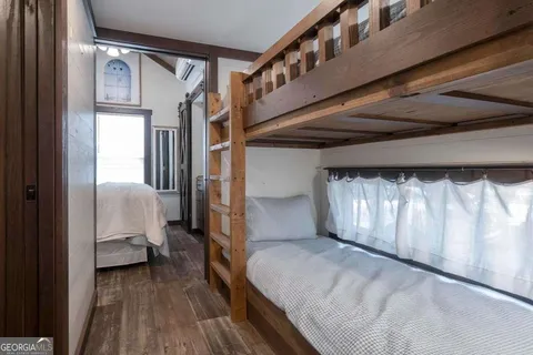 a view of a balcony with wooden floor and floor