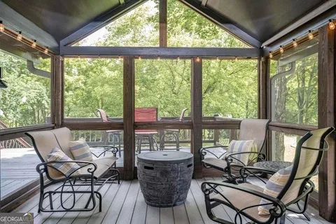a view of a living room and wooden floor