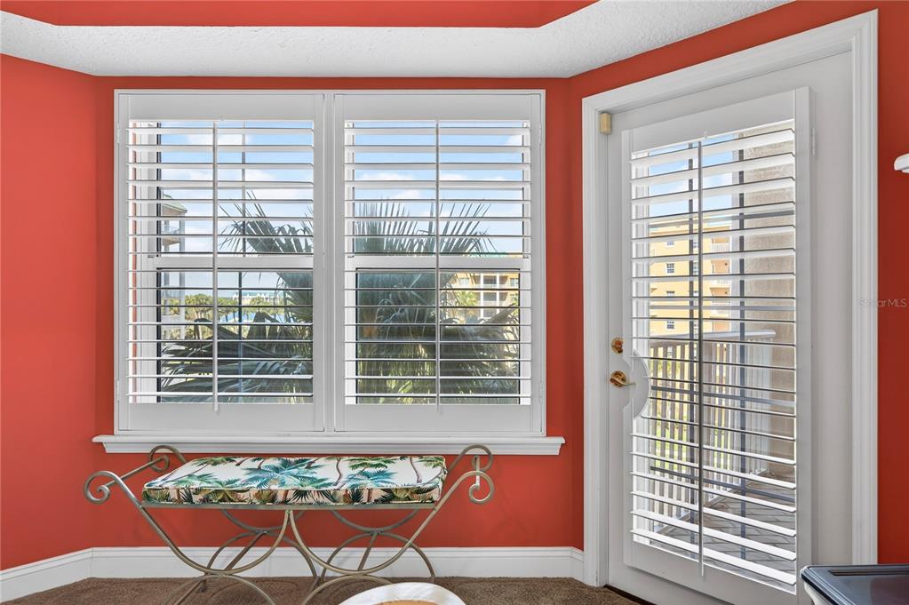 4670 Links Village Drive, Unit D506 Ponce Inlet, FL 32127 - Photo 21 of 60 a area with a table and chair