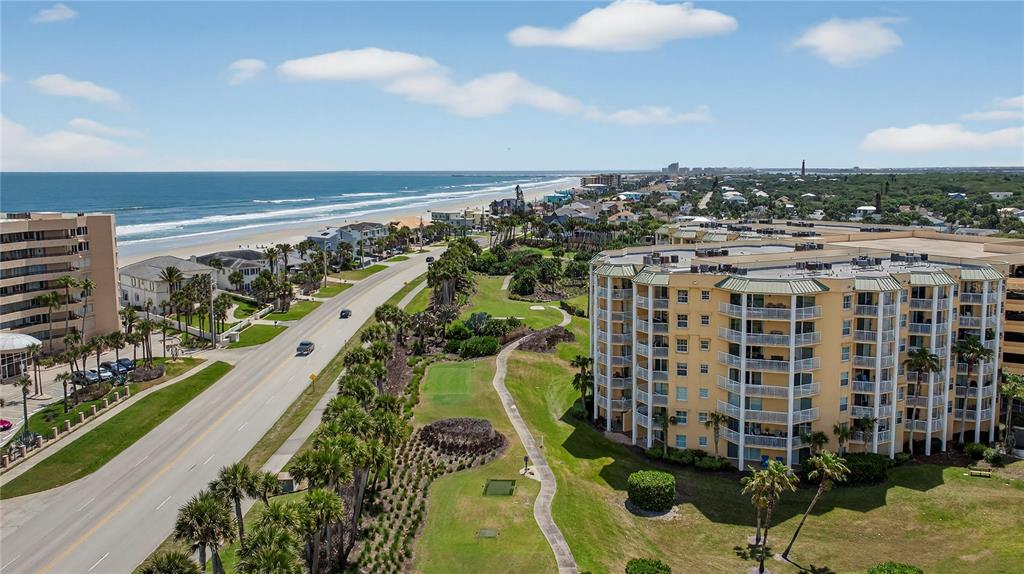 4670 Links Village Drive, Unit D506 Ponce Inlet, FL 32127 - Photo 38 of 60 a view of building with outdoor space