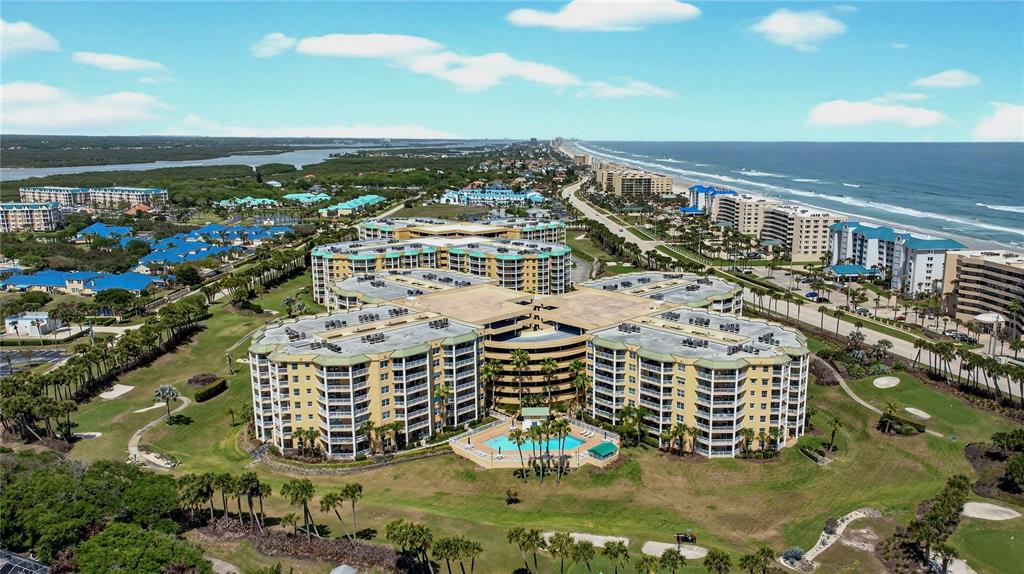 4670 Links Village Drive, Unit D506 Ponce Inlet, FL 32127 - Photo 39 of 60 a view of building with an ocean view