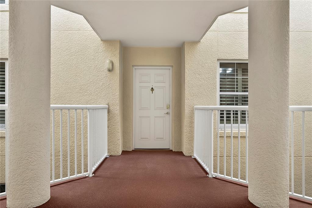 4670 Links Village Drive, Unit D506 Ponce Inlet, FL 32127 - Photo 54 of 60 an empty room with windows