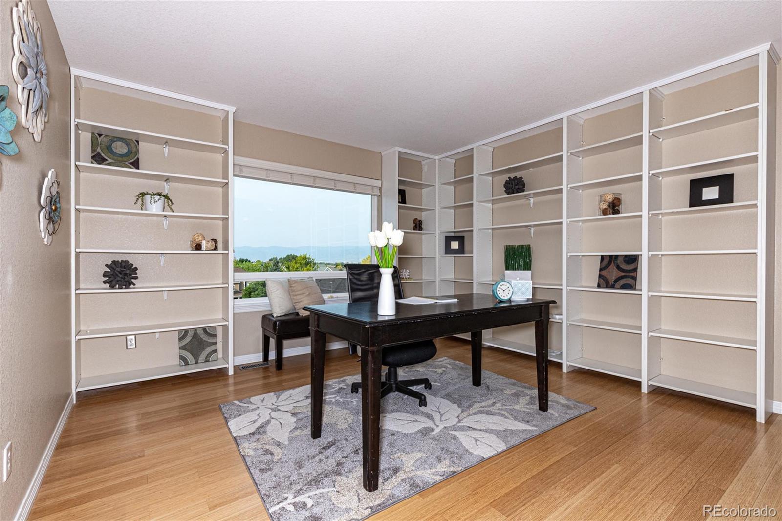 9939 Clyde Circle Highlands Ranch, CO 80129 - Photo 13 of 37 a view of a workspace with furniture