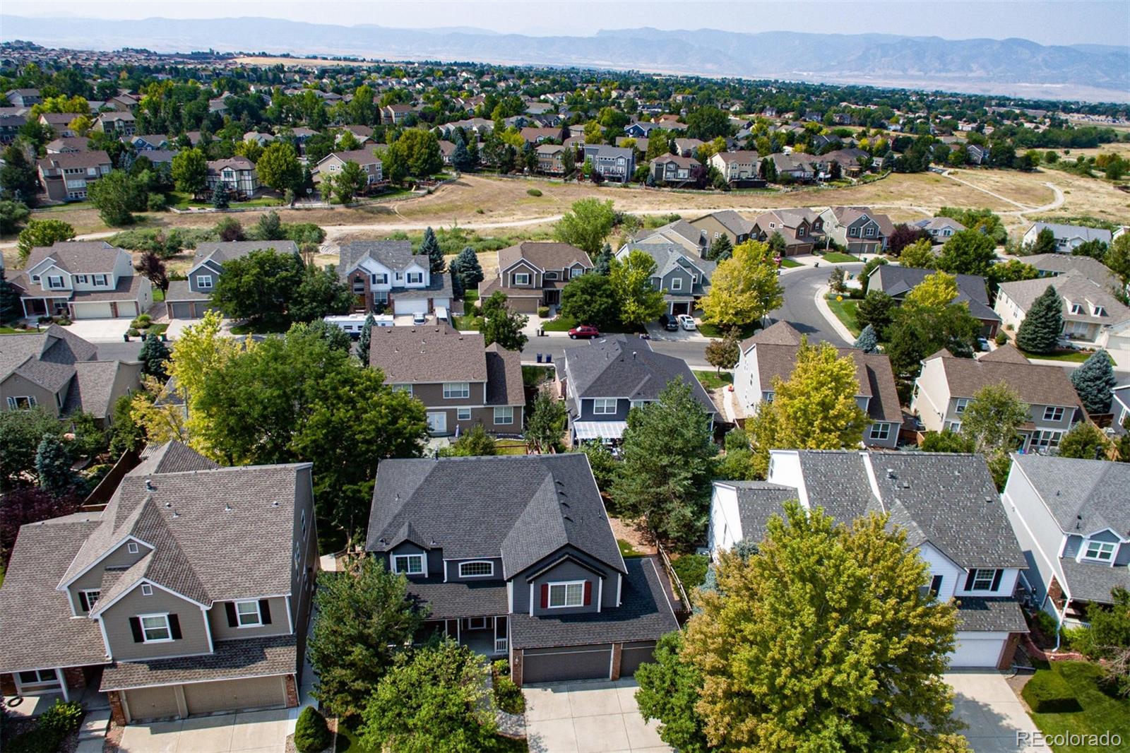 9939 Clyde Circle Highlands Ranch, CO 80129 - Photo 2 of 37 an aerial view of a house