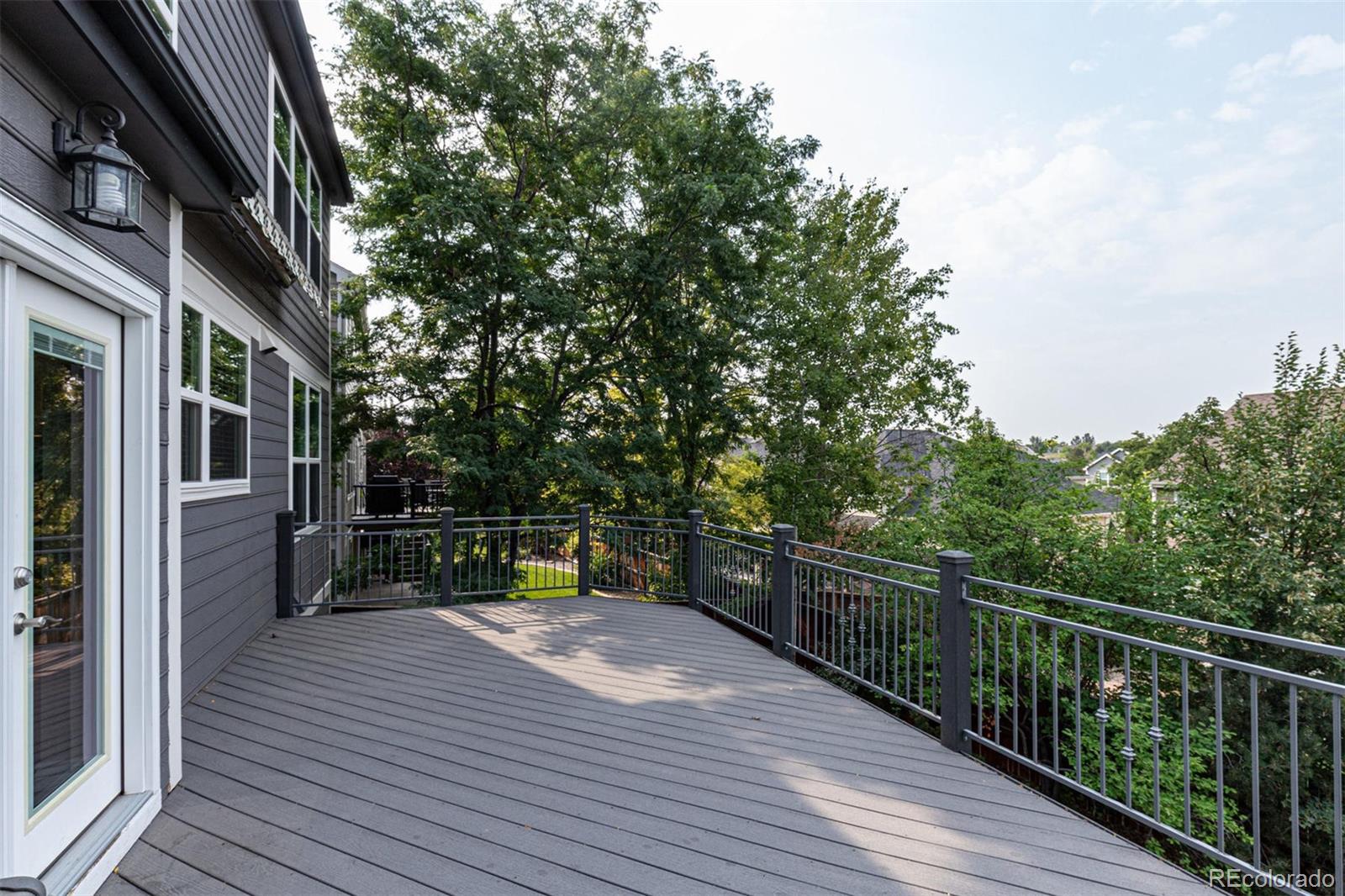 9939 Clyde Circle Highlands Ranch, CO 80129 - Photo 29 of 37 a view of outdoor space with deck and backyard