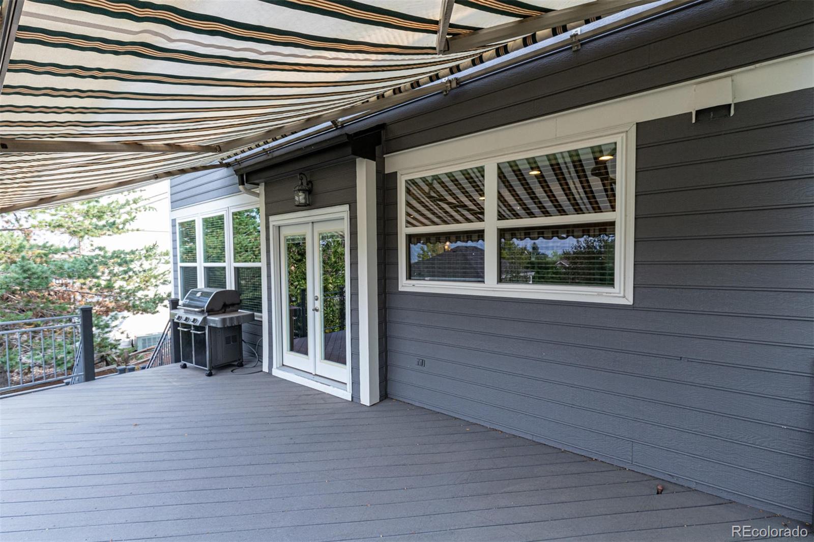 9939 Clyde Circle Highlands Ranch, CO 80129 - Photo 34 of 37 a view of a porch with furniture