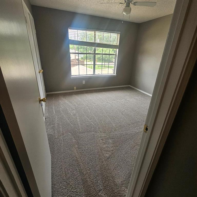 12 Trails Place, Unit AD Wylie, TX 75098 - Photo 11 of 40 a view of empty room with window