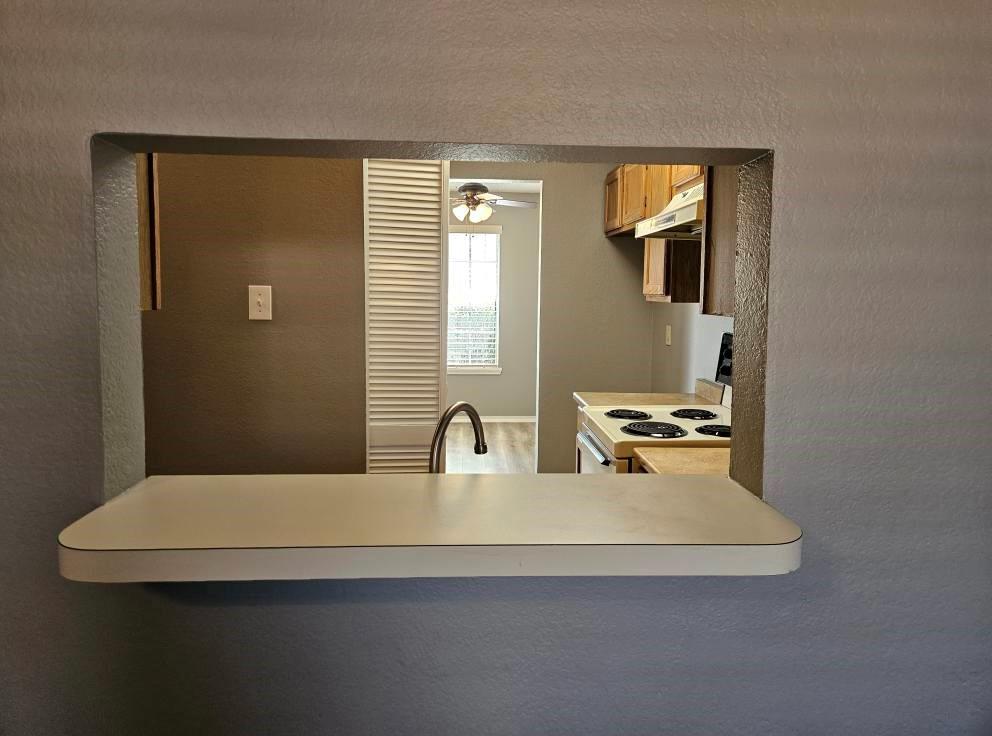 12 Trails Place, Unit AD Wylie, TX 75098 - Photo 14 of 40 a bathroom with a sink a toilet and mirror
