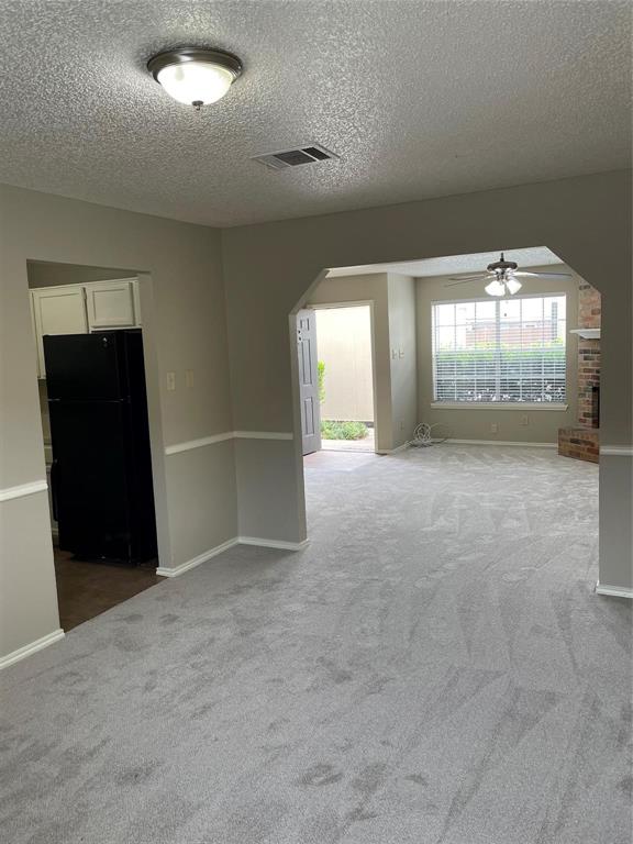 12 Trails Place, Unit AD Wylie, TX 75098 - Photo 19 of 40 en empty room with windows and closet
